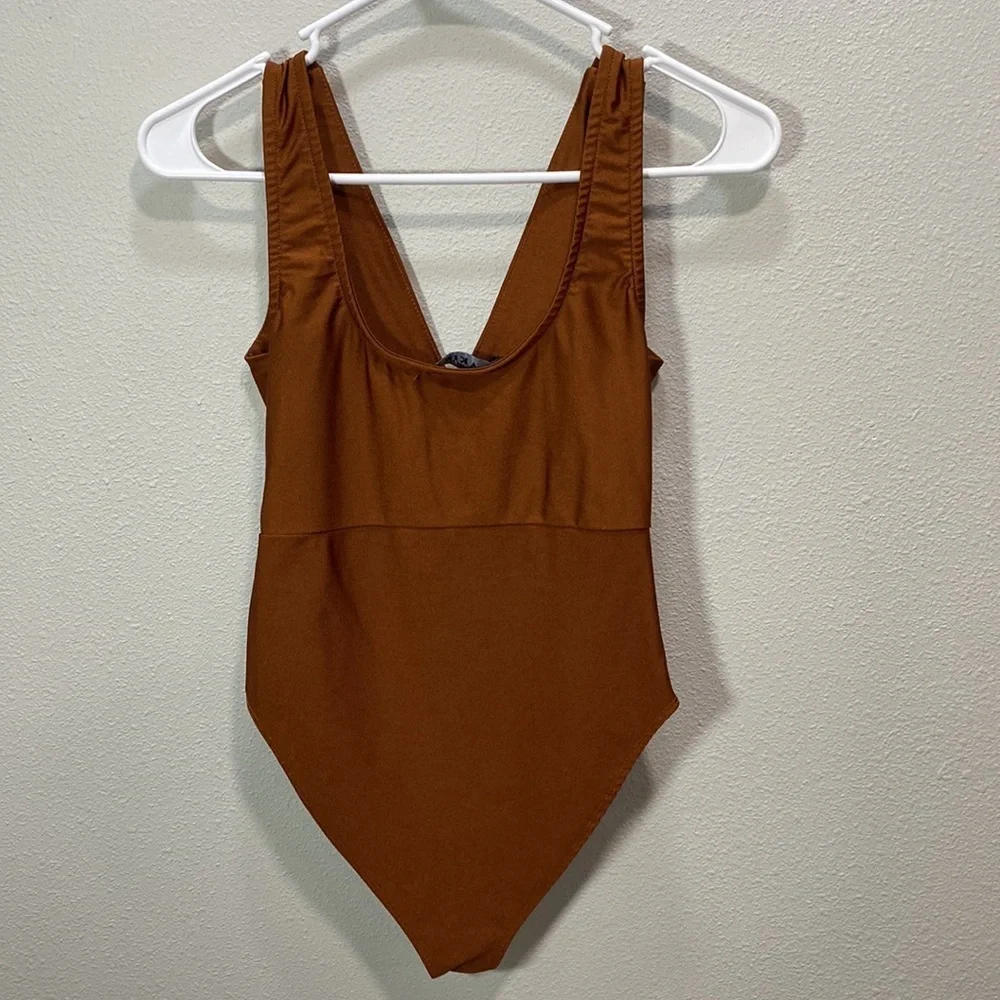 AKIRA bodysuit rust